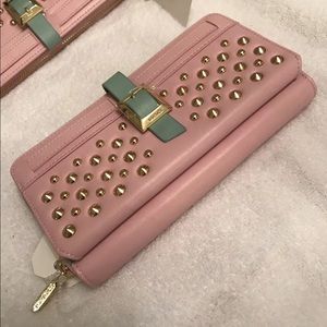 Gunas pink vegan leather wallet with gold studs